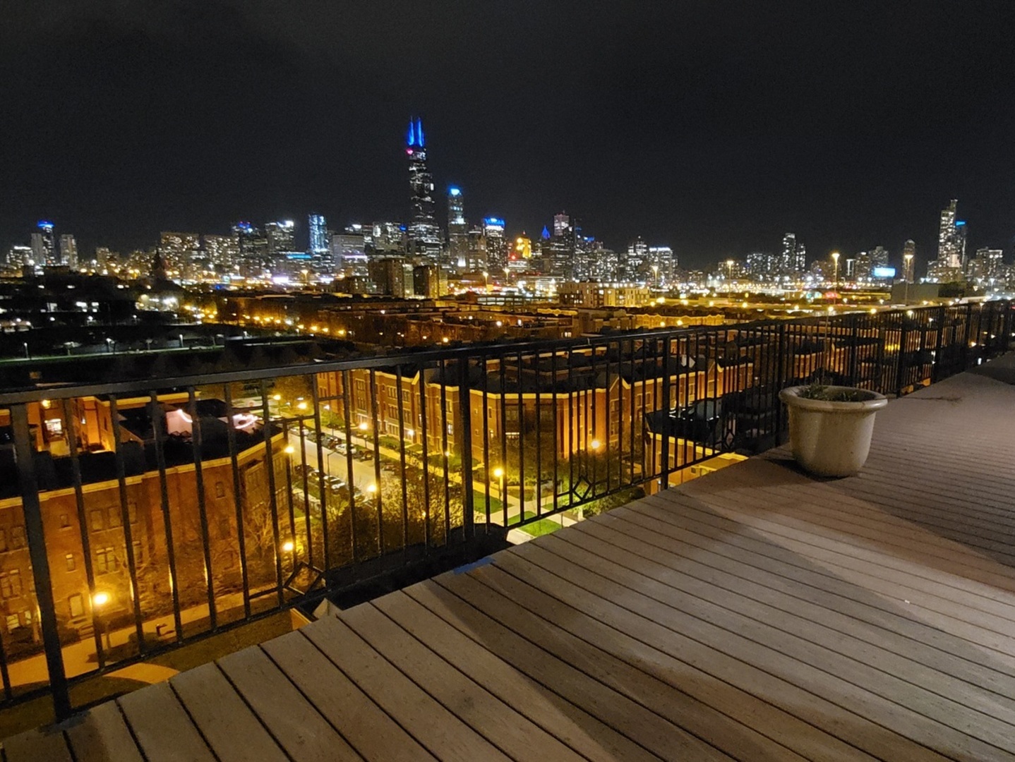 1525 South Sangamon Street, Unit 802P Chicago, IL 60608 - Photo 19 of 32 a view of a balcony deck and dining room