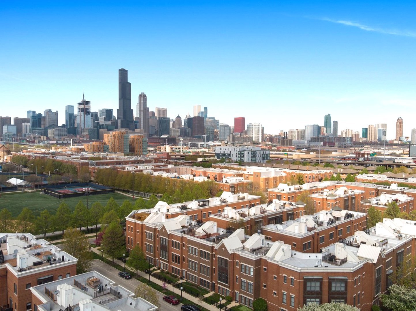 1525 South Sangamon Street, Unit 802P Chicago, IL 60608 - Photo 6 of 32 a view of a city with tall buildings