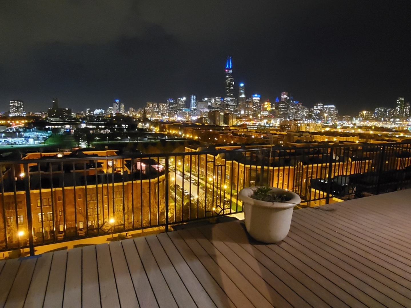 1525 South Sangamon Street, Unit 802P Chicago, IL 60608 - Photo 9 of 32 a view of a balcony with chairs