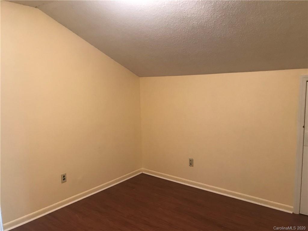 116 Walnut Street, Unit A Monroe, NC 28110 - Photo 4 of 5 a view of an empty room