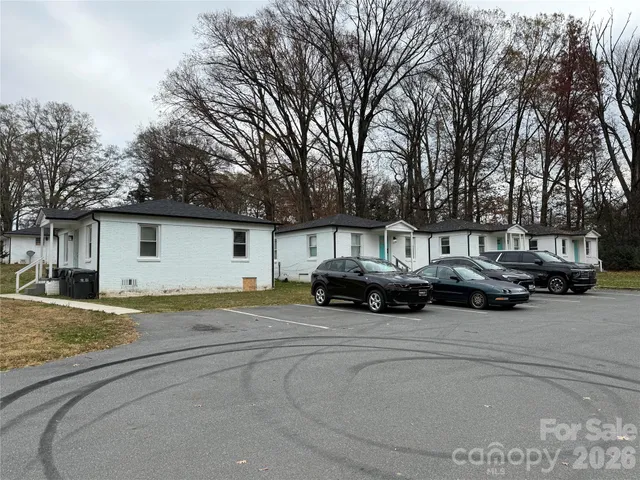 a house with trees in front of it