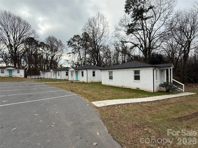 a view of a house with basketball court