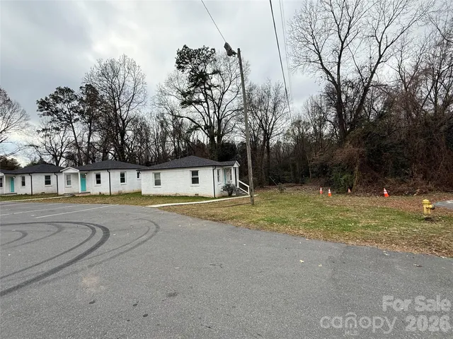 a front view of a house with yard