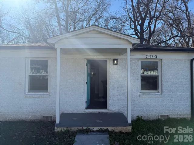 a view of dining room with wooden floor