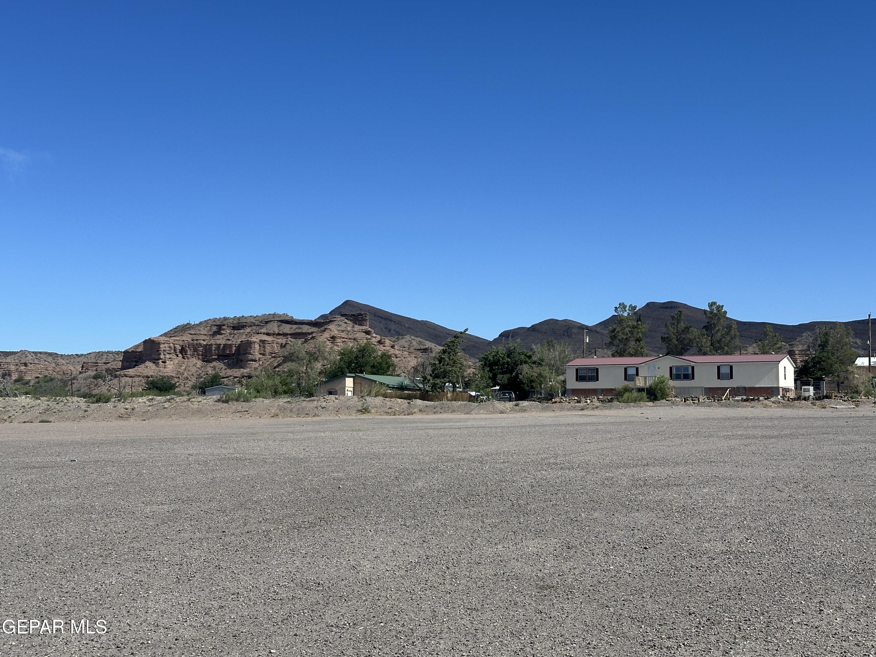 2901 Cook Street Truth Or Consequences, NM 87901 - Photo 28 of 28 a view of dirt road with a building in the background
