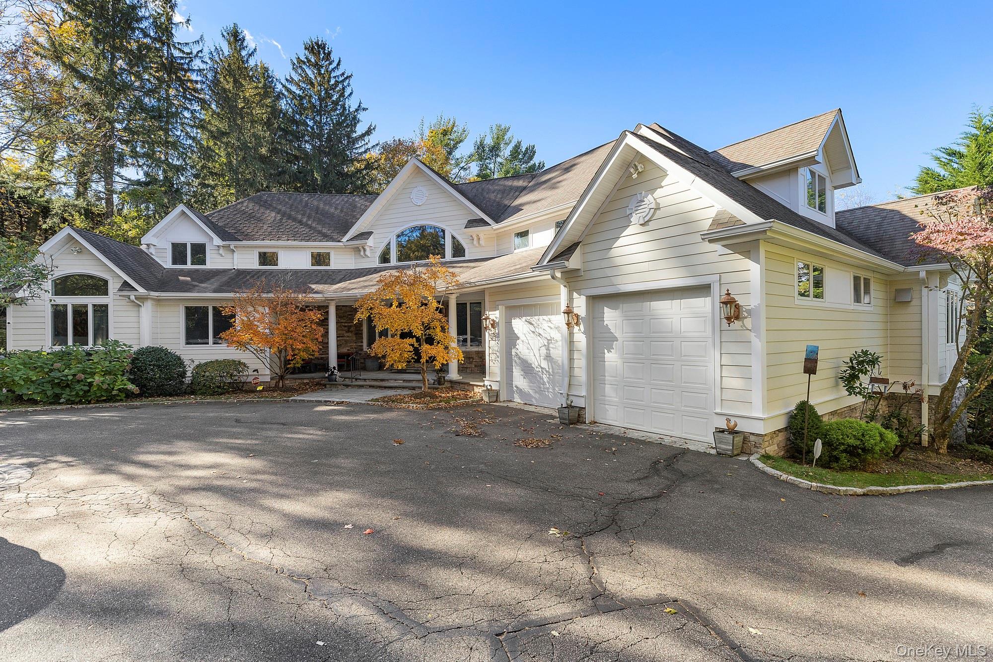 144 Round Swamp Road West Hills, NY 11743 - Photo 8 of 39 Traditional home with driveway and a porch