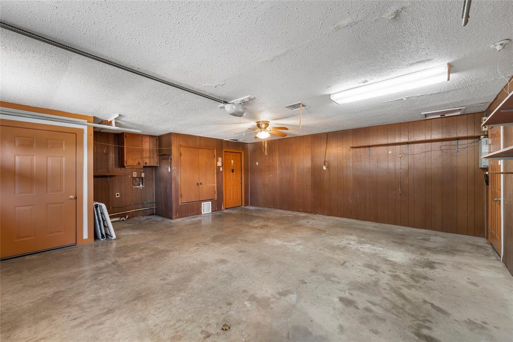232 Monterrey Drive Hewitt, TX 76643 - Photo 20 of 27 an empty room with closet and a chandelier fan