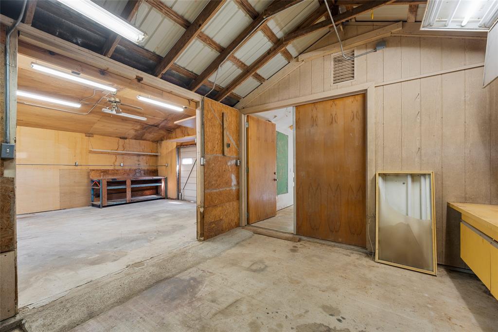 232 Monterrey Drive Hewitt, TX 76643 - Photo 21 of 27 a view of empty room with wooden walls
