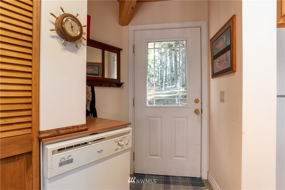 54 West Beach Path Olga, WA 98279 - Photo 17 of 39 a view of kitchen with wooden floor