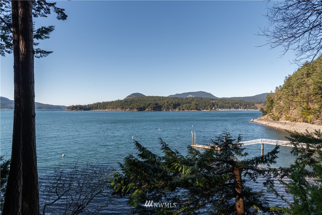 54 West Beach Path Olga, WA 98279 - Photo 2 of 39 a view of lake with mountain