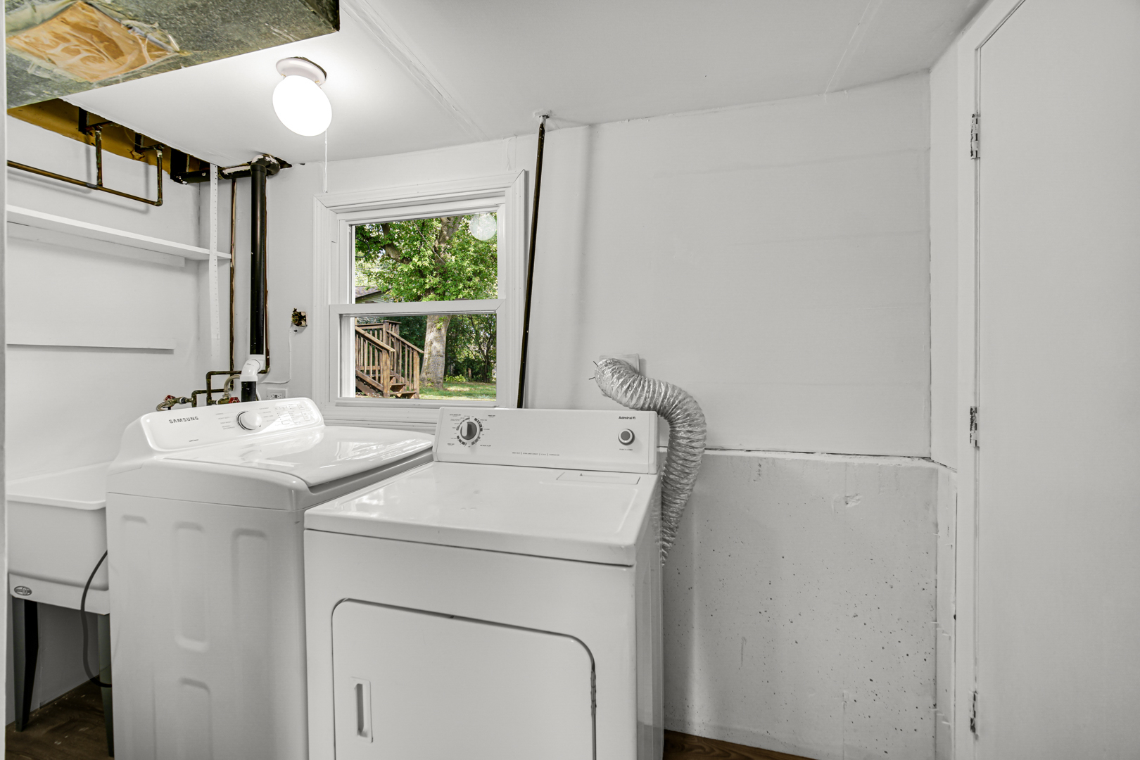 214 Oakleaf Road Lake In The Hills, IL 60156 - Photo 19 of 25 a utility room with dryer and washer