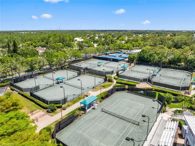 a view of a backyard with sitting area