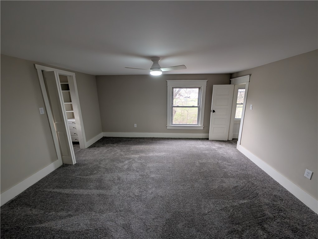 10796 Preble County Line Road Brookville, OH 45309 - Photo 22 of 33 This spacious room features cozy carpeting and elegant trim details.