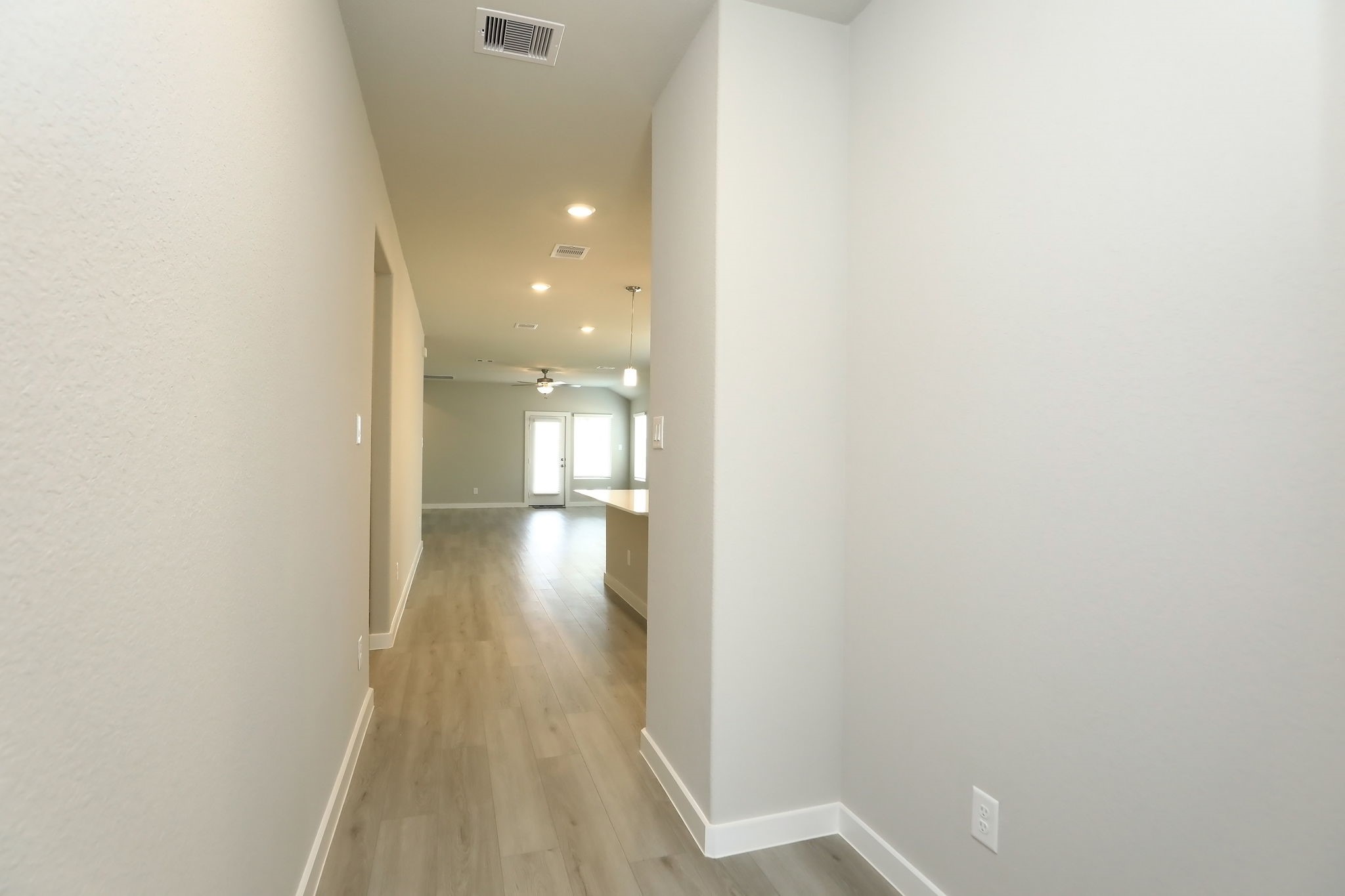 14110 Greystone Ter Street Magnolia, TX 77354 - Photo 2 of 34 The Clean, Modern, And Neutral Colors Will Impress Guests The Moment They Walk Through The Door. The Entire Interior Is Painted The Same Color And The Living Spaces Feature Luxury Vinyl Plank Flooring.