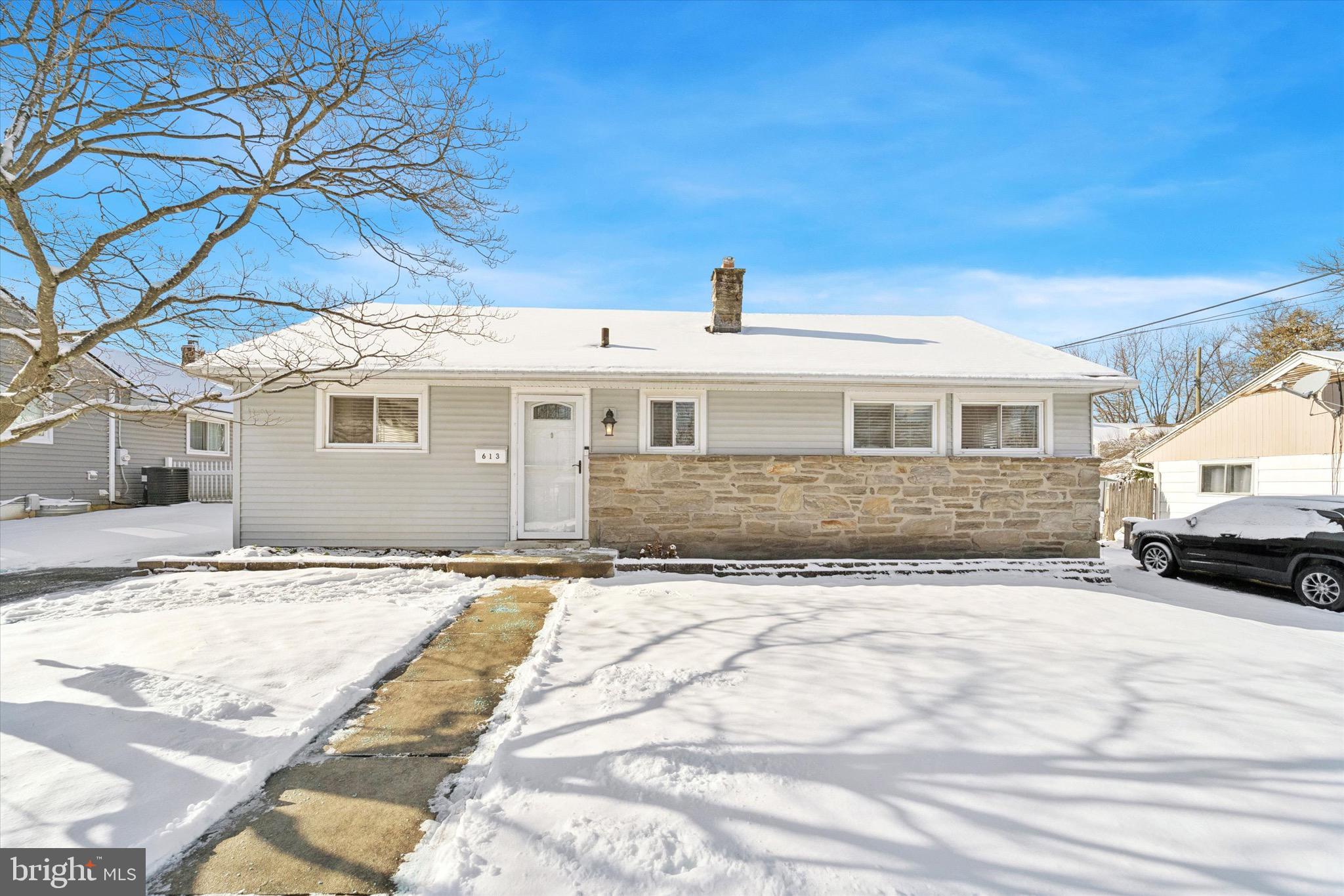 613 Springfield Avenue Folsom, PA 19033 - Photo 1 of 1 a front view of a house with a yard