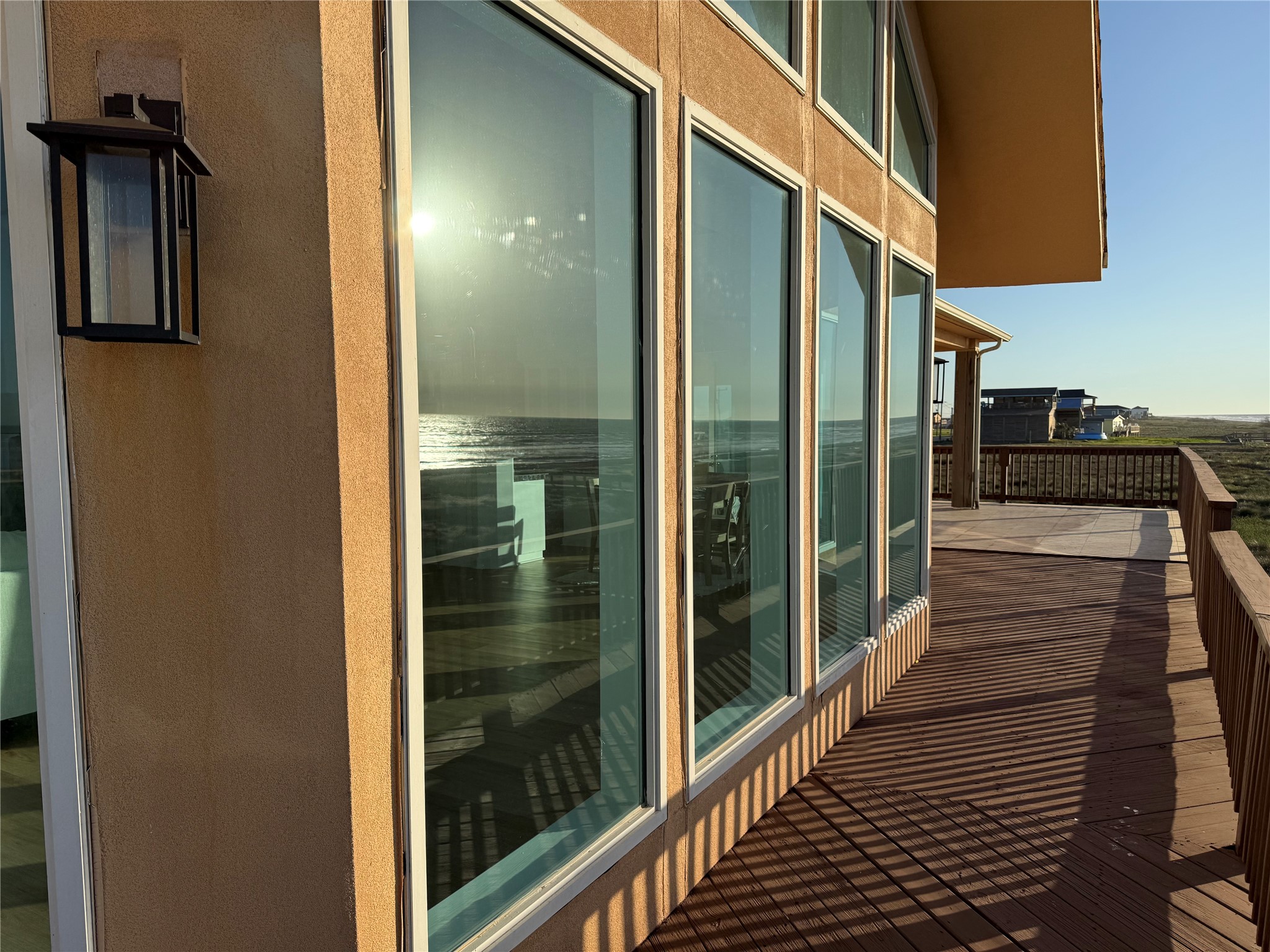 878 County Road 230 Sargent, TX 77414 - Photo 5 of 39 This photo features large windows offering stunning ocean views.