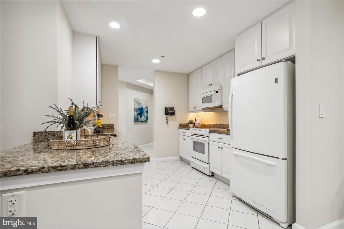 8300 Burdette Road, Unit 507 Bethesda, MD 20817 - Photo 13 of 64 Granite countertops, under-cabinet lighting