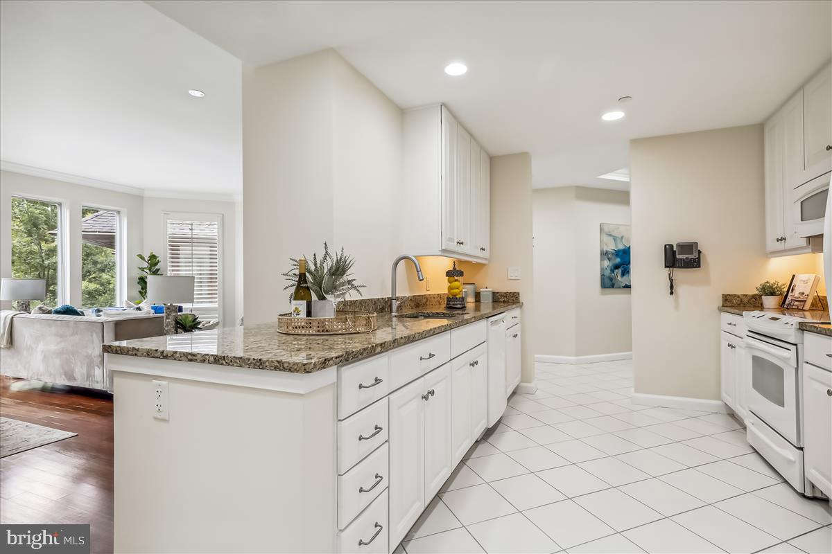 8300 Burdette Road, Unit 507 Bethesda, MD 20817 - Photo 14 of 64 Recessed lighting, tile flooring