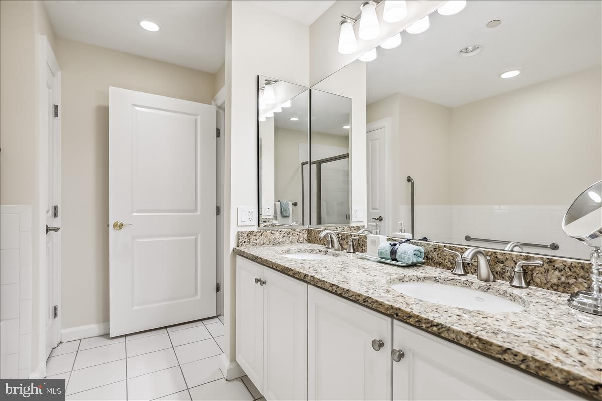 8300 Burdette Road, Unit 507 Bethesda, MD 20817 - Photo 23 of 64 Granite-topped vanity w/dual sinks