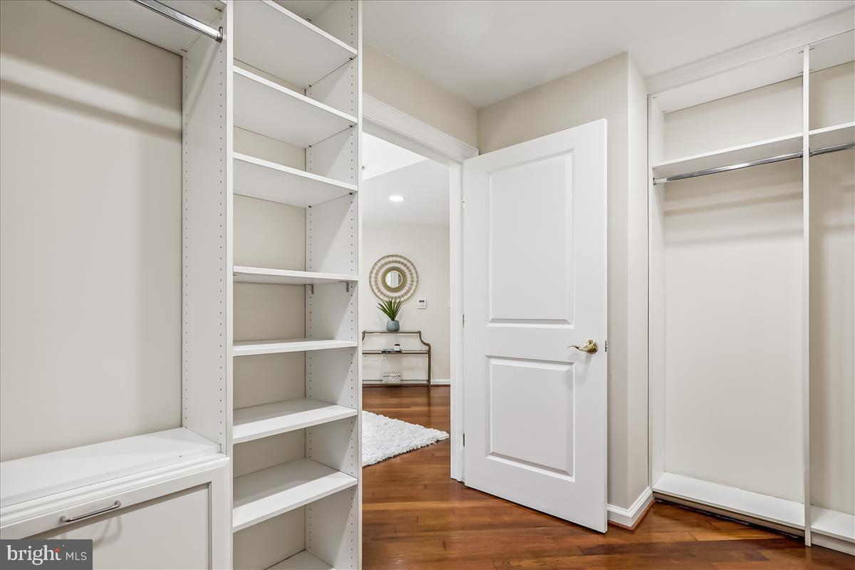 8300 Burdette Road, Unit 507 Bethesda, MD 20817 - Photo 25 of 64 Shelving, recessed lights, hardwood flooring