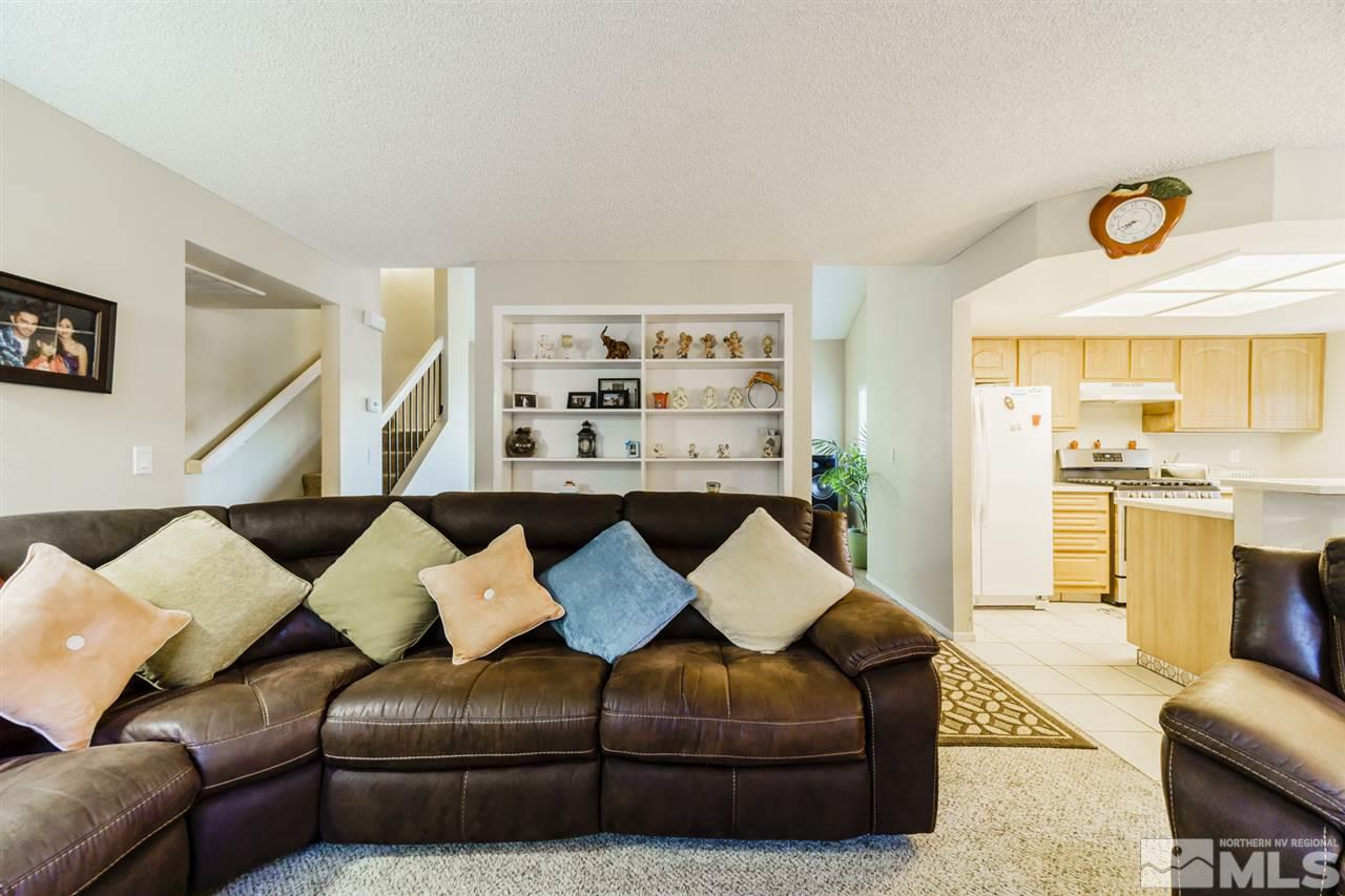 4275 Perro Lane Reno, NV 89502 - Photo 12 of 32 a living room with furniture and a large window