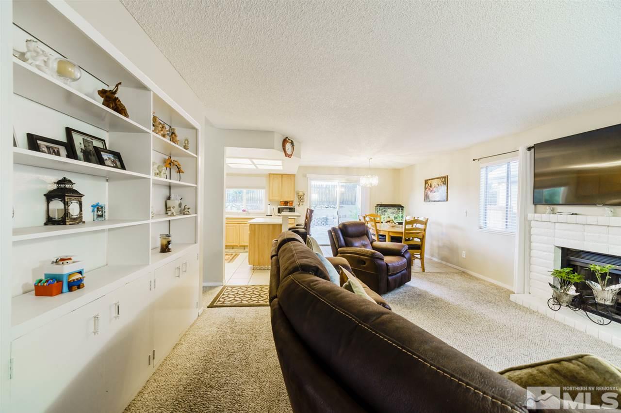 4275 Perro Lane Reno, NV 89502 - Photo 7 of 32 a living room with furniture and a flat screen tv