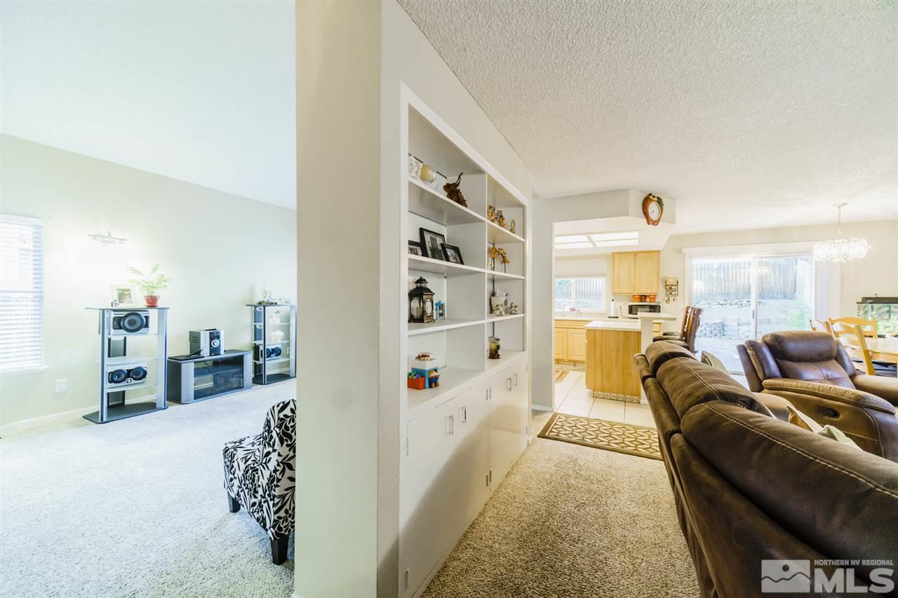 4275 Perro Lane Reno, NV 89502 - Photo 8 of 32 a living room with furniture and a large window