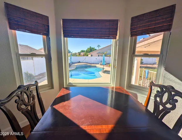 a bedroom with bed and a view of bedroom