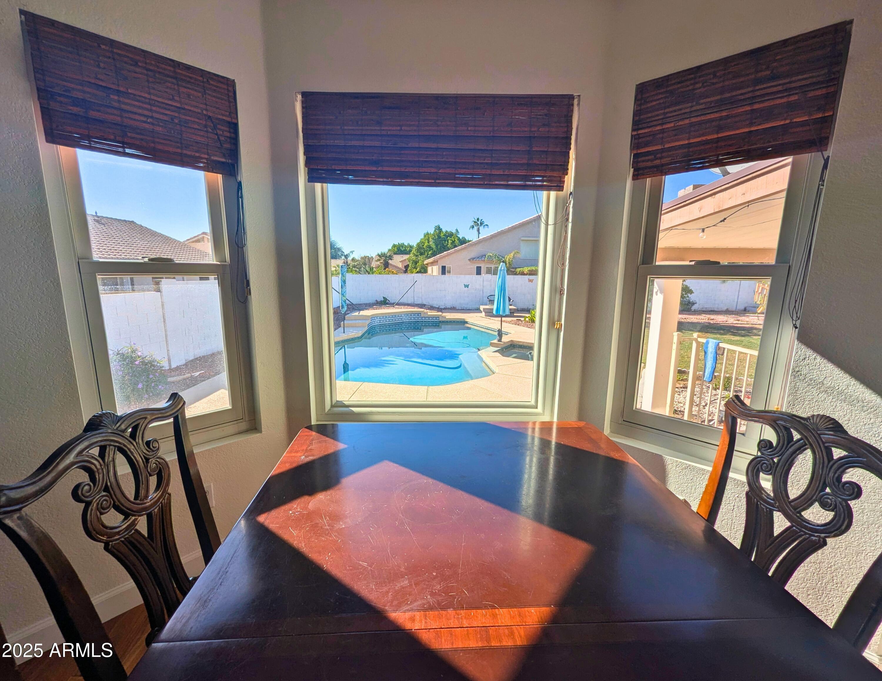 242 South Sycamore Place Chandler, AZ 85224 - Photo 13 of 40 a room with furniture and wooden floor