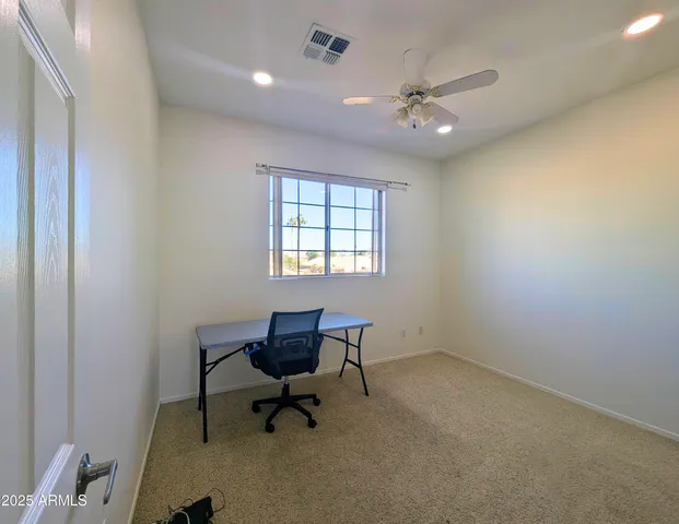 a view of a room with an empty space