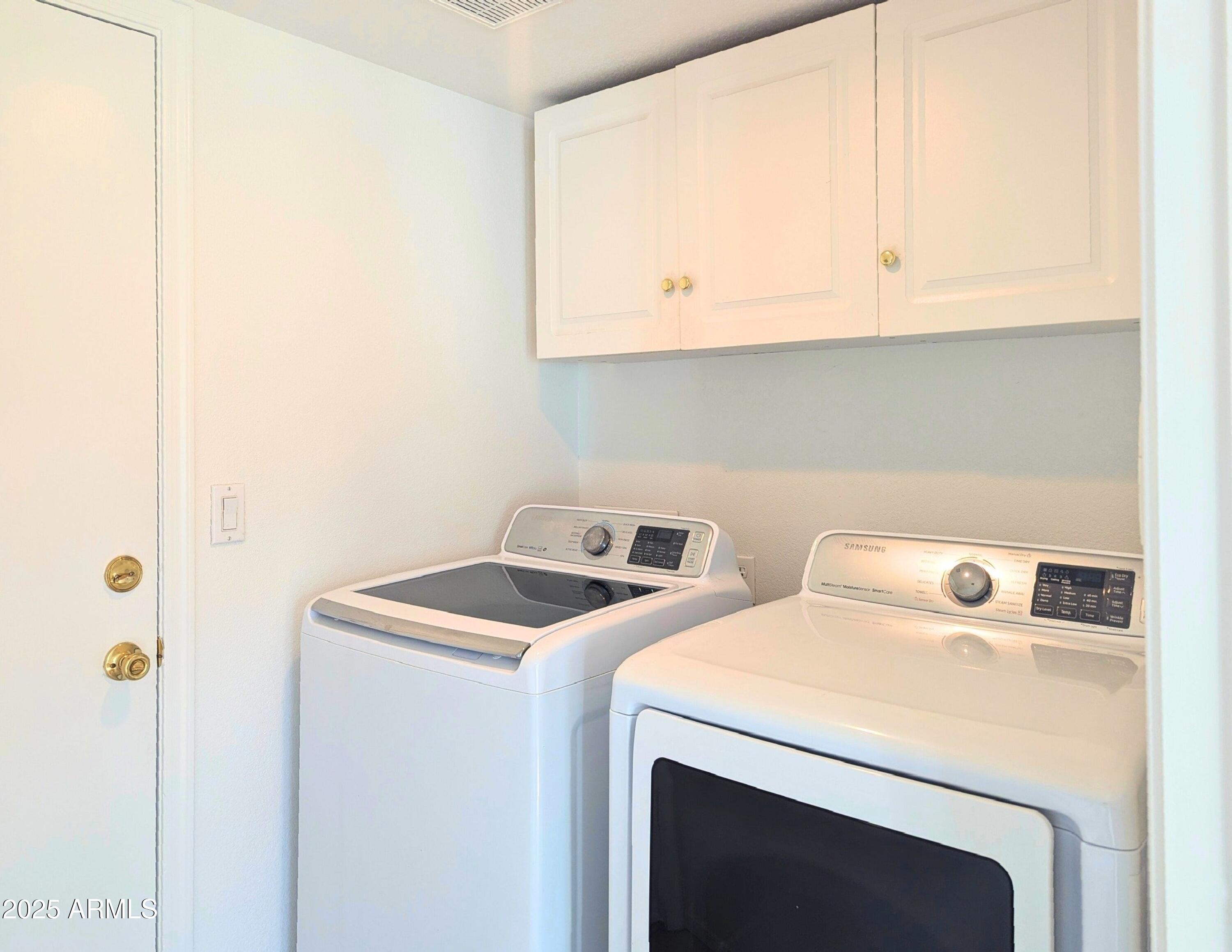 242 South Sycamore Place Chandler, AZ 85224 - Photo 29 of 40 a utility room with dryer and washer
