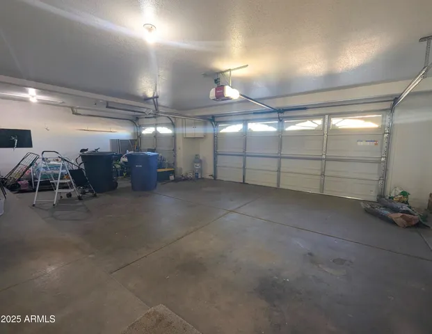 a view of swimming pool with a yard