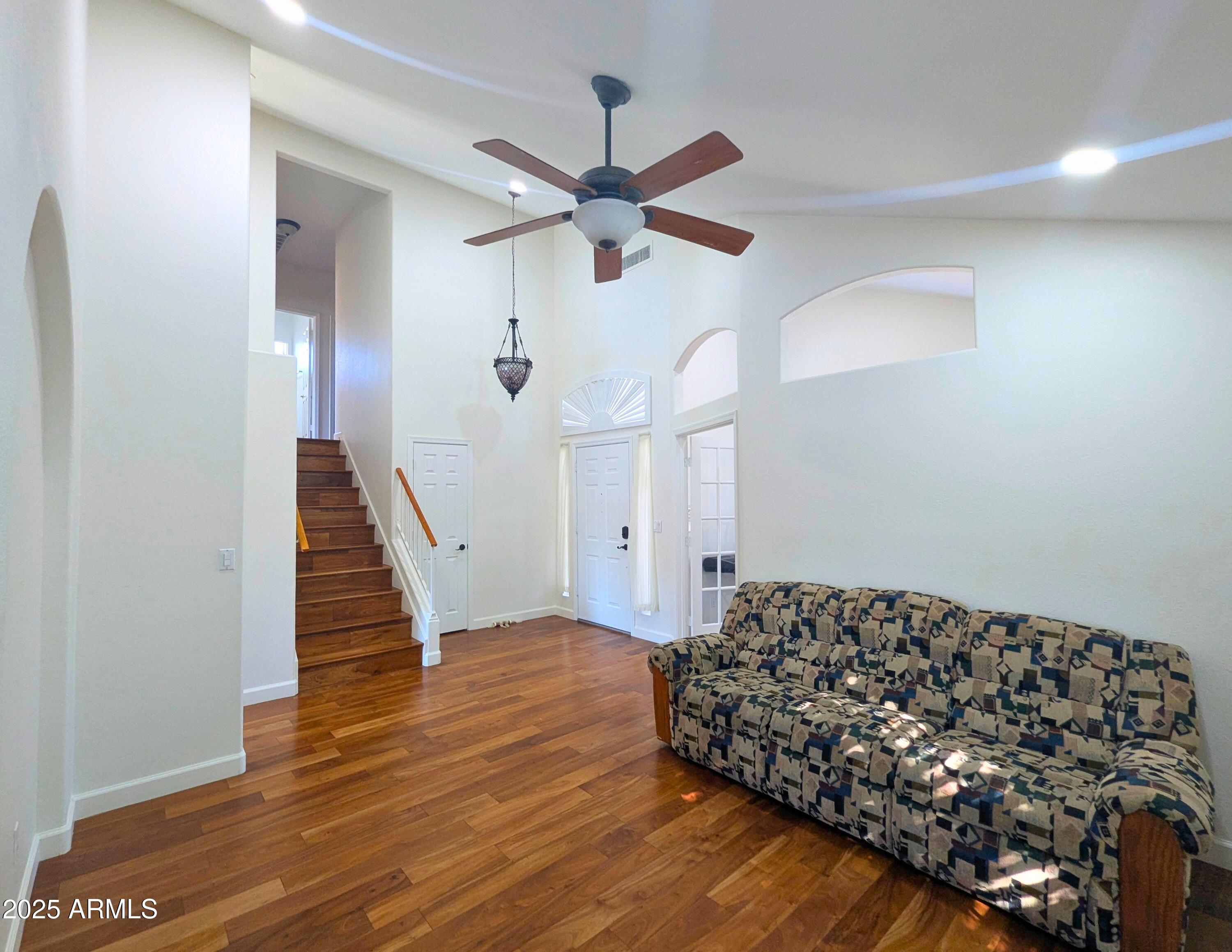 242 South Sycamore Place Chandler, AZ 85224 - Photo 6 of 40 a view of entryway and hall with wooden floor