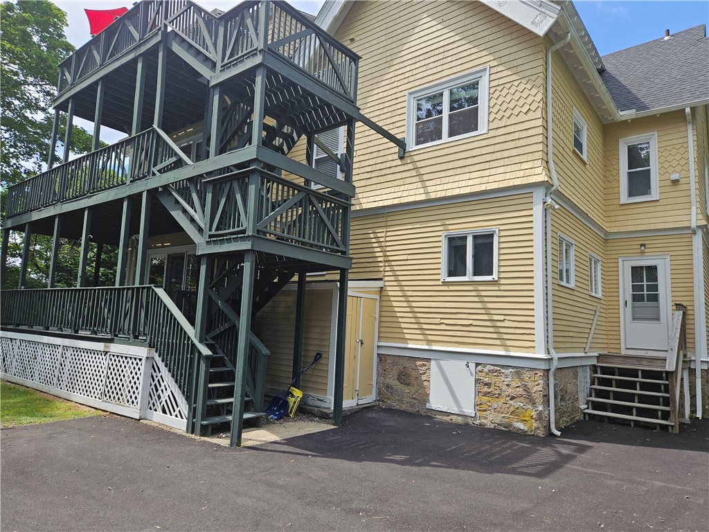 49 Merton Road, Unit 2 Newport, RI 02840 - Photo 41 of 42 Rear of building with 3 level decks and stairways
View to basement walkout door access to storage.