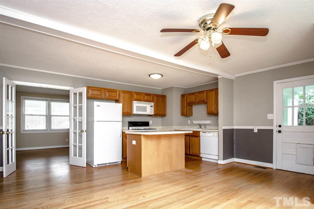 736 Mial Street Raleigh, NC 27608 - Photo 12 of 23 a kitchen with a stove and a refrigerator