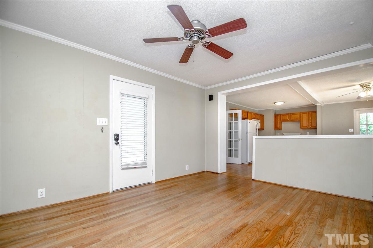 736 Mial Street Raleigh, NC 27608 - Photo 5 of 23 a view of an empty room and window