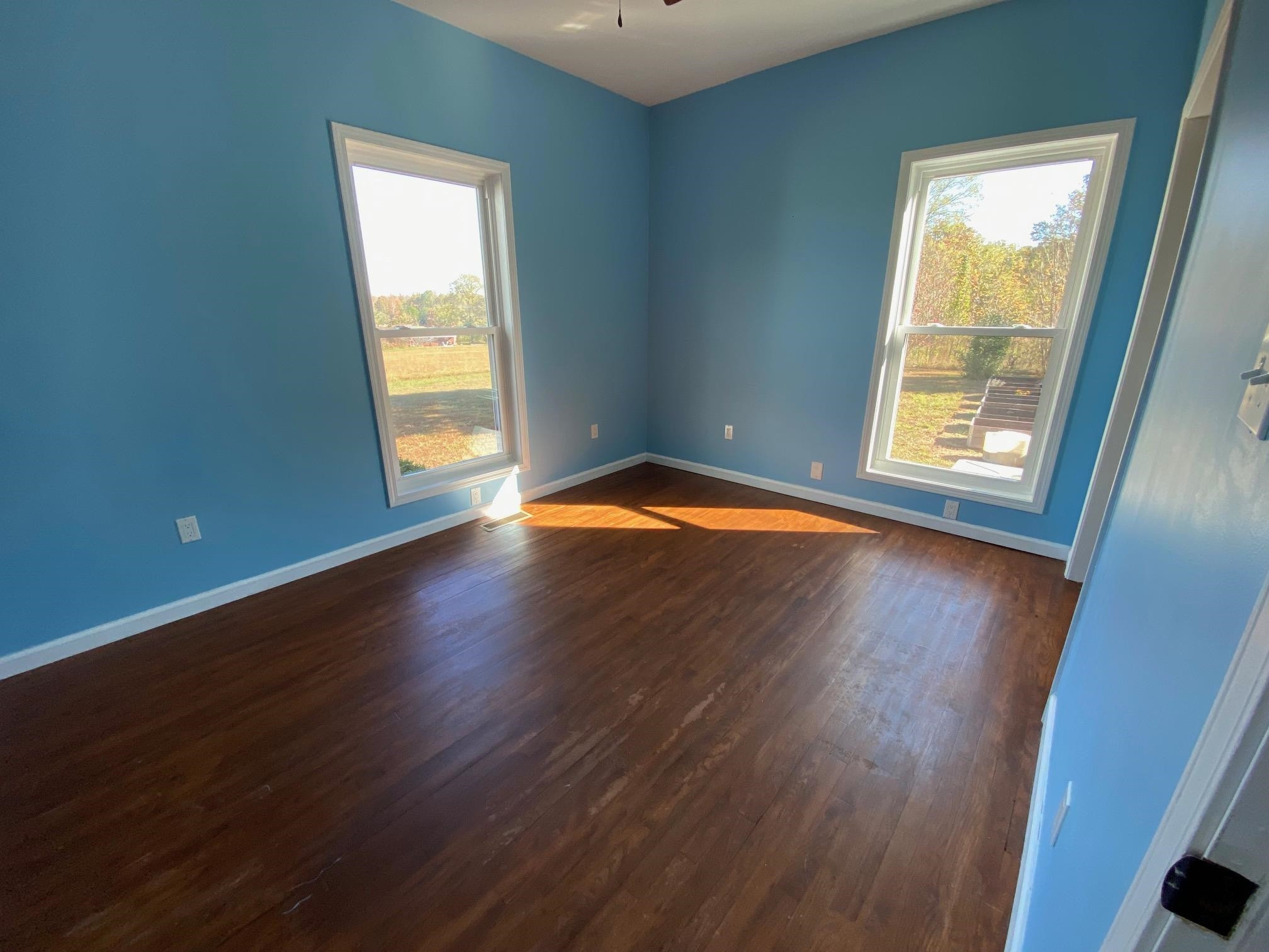 3650 Talley Store Road Henderson, TN 38340 - Photo 33 of 42 a view of empty room with wooden floor and fan