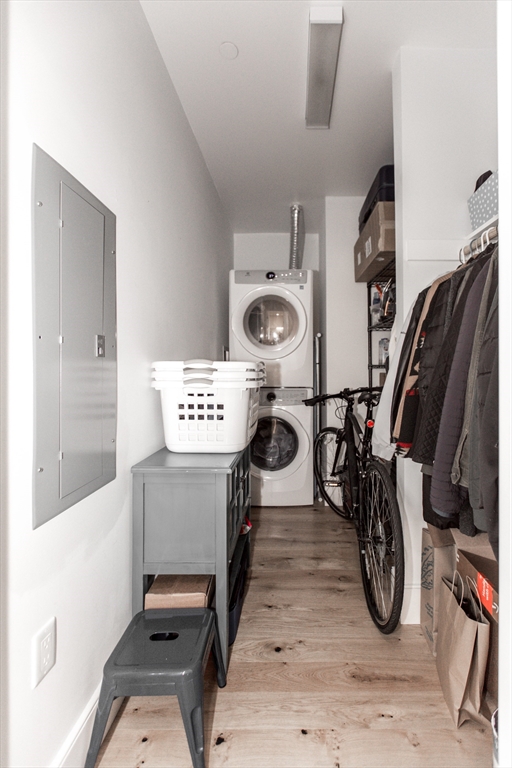 30 Polk Street, Unit 103 Boston, MA 02129 - Photo 16 of 20 a view of walk in closet with clothes and shoes