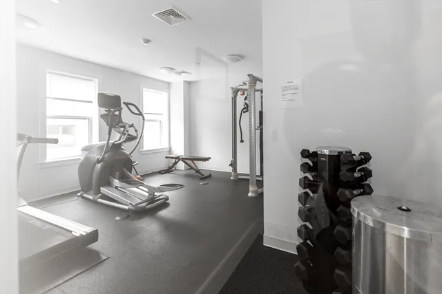 a view of a room with gym equipment