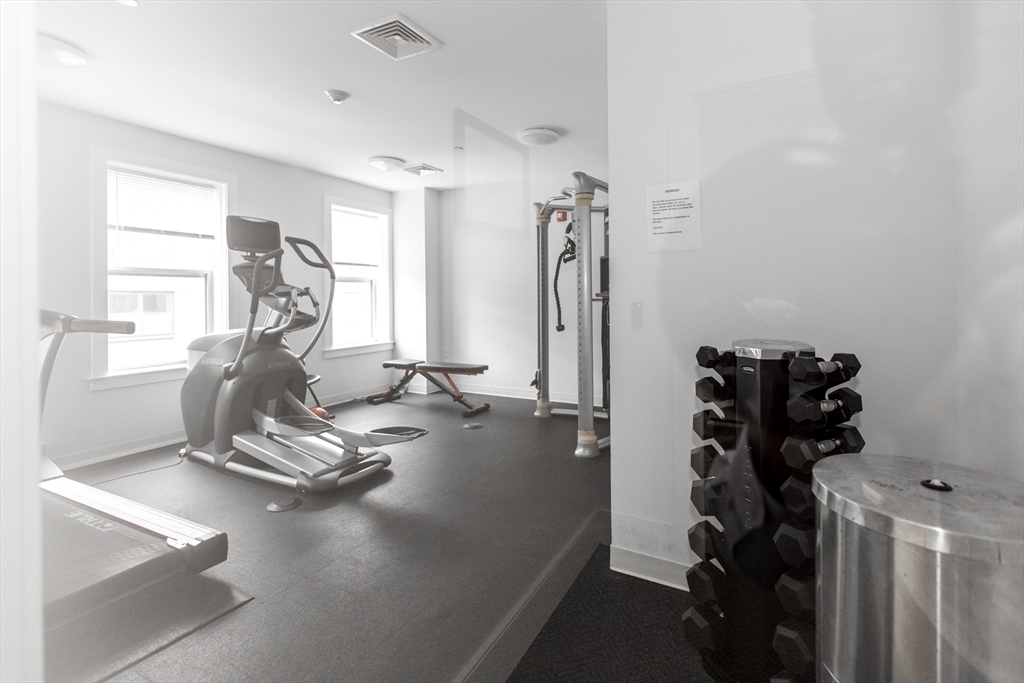 30 Polk Street, Unit 103 Boston, MA 02129 - Photo 18 of 20 a view of a room with gym equipment