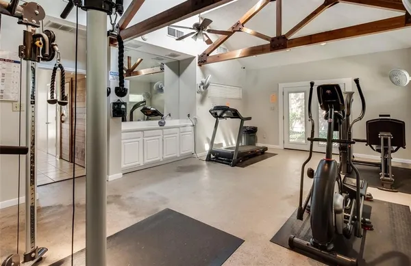 a view of a room with gym equipment