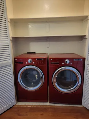a utility room with dryer and washer