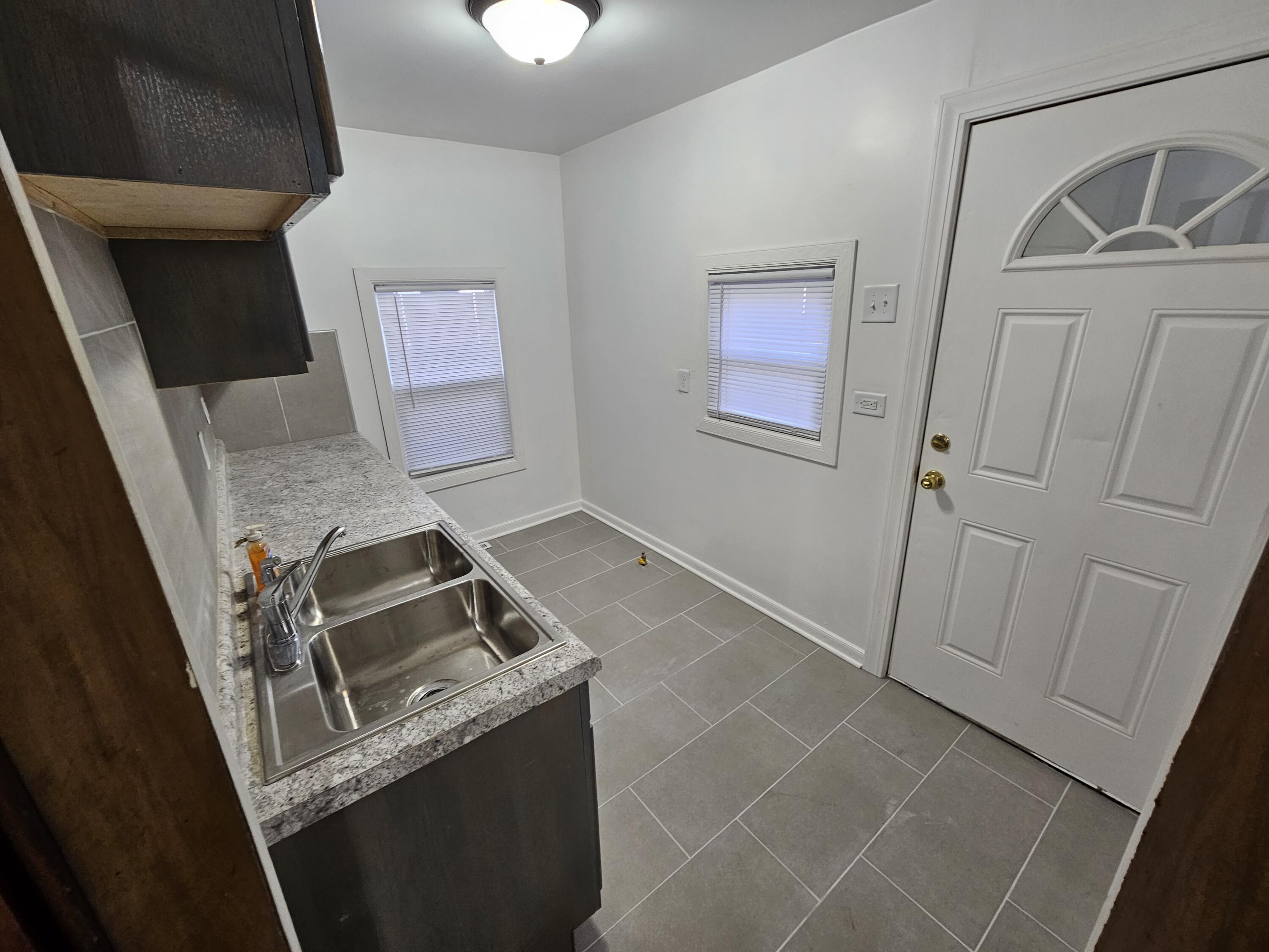 4471 Massachusetts Street Gary, IN 46409 - Photo 4 of 20 a room with storage and utility