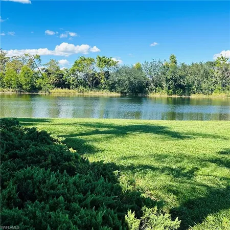 a view of a lake with a city view