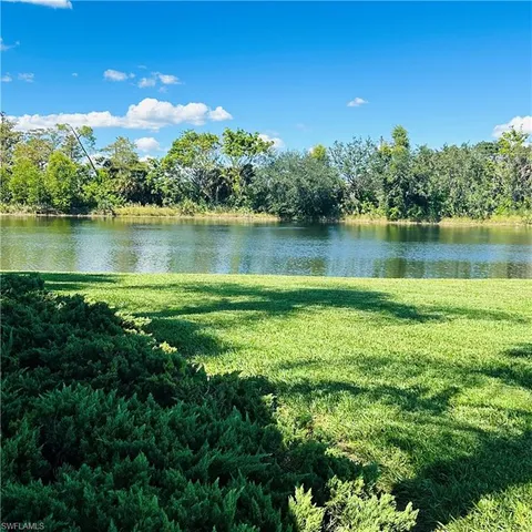 a view of a lake with a city view