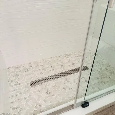 a view of wooden floor in a bathroom