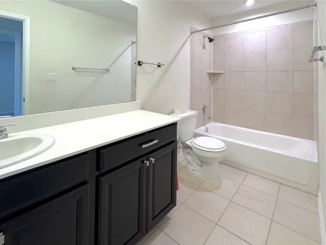 an empty room that has a window in it