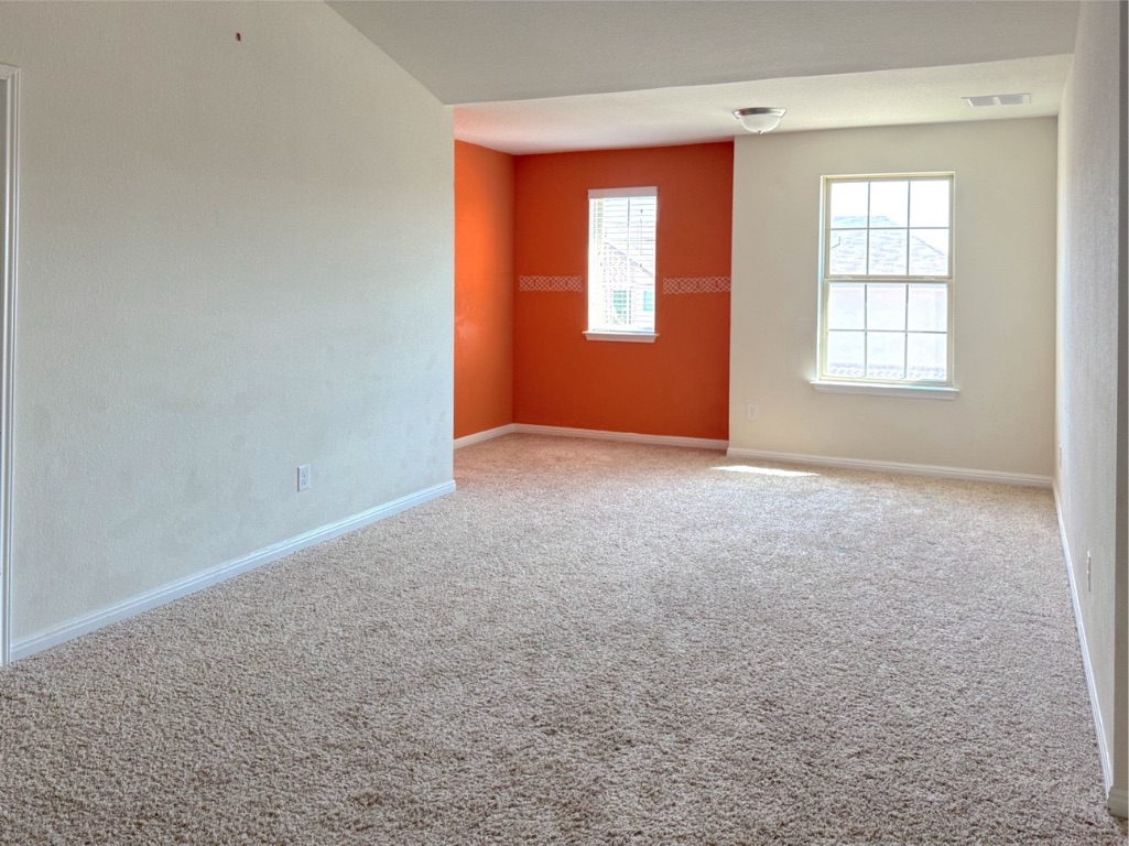 2056 Hat Bender Loop Round Rock, TX 78664 - Photo 22 of 27 an empty room with windows