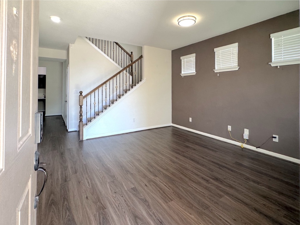 2056 Hat Bender Loop Round Rock, TX 78664 - Photo 3 of 27 a view of an entryway with wooden floor