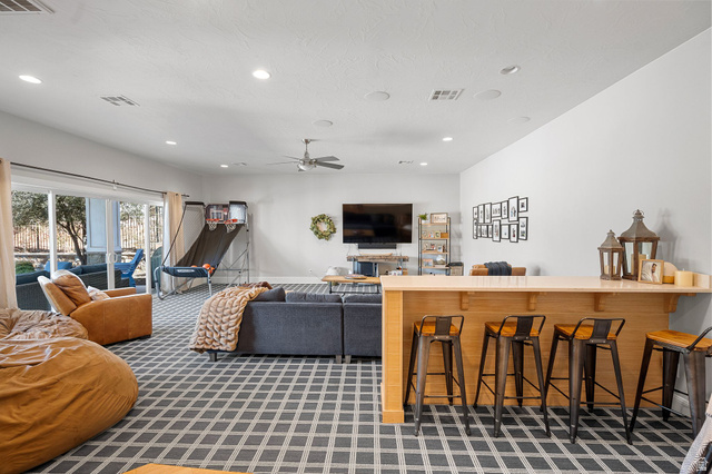 2917 Old Farm Road Washington, UT 84780 - Photo 57 of 105 Living room featuring carpet flooring, a ceiling fan, and recessed lighting